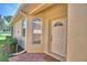 Inviting front entrance with a brick pathway and white front door at 1674 Linz Ct, Winter Haven, FL 33884