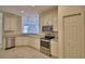 Well-equipped kitchen with stainless steel appliances and granite countertops at 1674 Linz Ct, Winter Haven, FL 33884
