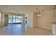 Open-concept living area with sliding glass doors to the outside at 1674 Linz Ct, Winter Haven, FL 33884