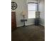Bright bedroom features a large window and classic decor at 1681 Waterview Loop, Haines City, FL 33844