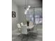Elegant dining room featuring modern lighting and a stylish table setting at 1681 Waterview Loop, Haines City, FL 33844