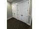 Bedroom features two large closets with contemporary doors and black hardware at 1781 Lakehill Dr, Winter Haven, FL 33884