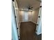 Bright bedroom with hardwood floors, neutral walls, and a ceiling fan for comfort at 1781 Lakehill Dr, Winter Haven, FL 33884