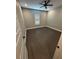A bedroom with wood-look flooring and a window with light-filtering shades at 1781 Lakehill Dr, Winter Haven, FL 33884
