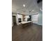 Open-concept kitchen with a large island, stainless steel appliances, and abundant cabinet space at 1781 Lakehill Dr, Winter Haven, FL 33884