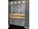 Stylish kitchen cabinets with glass accents, under-cabinet lighting, and modern hardware at 1781 Lakehill Dr, Winter Haven, FL 33884