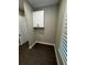 Laundry room features a cabinet for storage, with connections ready for a washer and dryer installation at 1781 Lakehill Dr, Winter Haven, FL 33884
