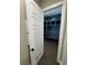 Mudroom featuring built-in storage lockers and bench, viewed from hallway entrance with opened door at 1781 Lakehill Dr, Winter Haven, FL 33884