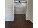 Bright bedroom features ceiling fan, plantation shutters and hard wood floors at 1787 Lakehill Dr, Winter Haven, FL 33884