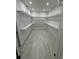 Spacious walk-in closet with wood floors and white shelving at 1787 Lakehill Dr, Winter Haven, FL 33884