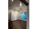 Open dining area featuring hardwood floors and doors leading to the outside at 1787 Lakehill Dr, Winter Haven, FL 33884
