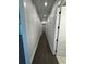 Long hallway with recessed lighting and hard wood floors at 1787 Lakehill Dr, Winter Haven, FL 33884