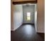Entrance Hallway featuring Hardwood floors and a front door view at 1787 Lakehill Dr, Winter Haven, FL 33884