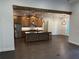 Open kitchen concept features an island, stainless steel appliances, and stylish pendant lighting at 1787 Lakehill Dr, Winter Haven, FL 33884
