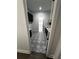 Bright laundry room featuring patterned floor tiles and shaker cabinets with modern hardware at 1787 Lakehill Dr, Winter Haven, FL 33884