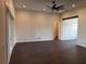 Spacious living room features hard wood floors, ceiling fan and neutral walls at 1787 Lakehill Dr, Winter Haven, FL 33884