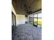 Covered patio features a ceiling fan, brick floor, and access to the yard at 1787 Lakehill Dr, Winter Haven, FL 33884