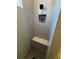Stylish shower with gray vertical tiling, a built-in seat, and a decorative niche with patterned tile at 1787 Lakehill Dr, Winter Haven, FL 33884