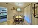 Cozy breakfast nook with a round table, seating for four, and natural light at 186 Viola Dr, Auburndale, FL 33823