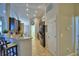 Kitchen with a breakfast bar with seating, tile floors, and stainless steel appliances at 186 Viola Dr, Auburndale, FL 33823