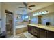 Spacious bathroom with double sinks, soaking tub, and a glass enclosed shower at 186 Viola Dr, Auburndale, FL 33823