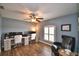 Home office with fan, neutral colors, and wood-look flooring at 186 Viola Dr, Auburndale, FL 33823