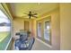 Cozy screened-in patio with outdoor seating and backyard access at 186 Viola Dr, Auburndale, FL 33823