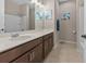 Bathroom with a white countertop sink and a shower and tub combo at 225 Summershore Dr, Auburndale, FL 33823