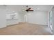 Open-concept living room with modern finishes and a ceiling fan at 230 Cove At Eagle Lake Cir, Eagle Lake, FL 33839