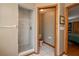 Modern bathroom with a walk-in shower and tile flooring, offering a clean and contemporary design at 2390 Lake Easy Rd, Babson Park, FL 33827
