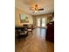 Inviting dining area featuring a round table and chairs, offering a comfortable and stylish space at 2390 Lake Easy Rd, Babson Park, FL 33827