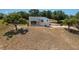 Charming single-Gathering home on a large lot with mature trees and a spacious front yard at 2390 Lake Easy Rd, Babson Park, FL 33827