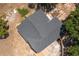 Aerial view of the dark gray roof of a well-maintained single-Gathering home with a driveway at 2390 Lake Easy Rd, Babson Park, FL 33827