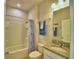Traditional bathroom with tub, toilet, and single vanity at 2577 Canyon Crest Dr, Lakeland, FL 33811
