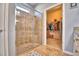 Shower in bathroom with glass doors and view to the closet at 2577 Canyon Crest Dr, Lakeland, FL 33811