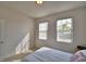 Neutral bedroom featuring carpeting and a lot of natural light at 2577 Canyon Crest Dr, Lakeland, FL 33811