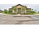Inviting clubhouse entrance featuring lush landscaping and well-manicured surroundings at 2577 Canyon Crest Dr, Lakeland, FL 33811