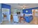 Bright living room with coastal decor, opening to kitchen and bedroom at 2577 Canyon Crest Dr, Lakeland, FL 33811