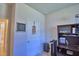 View of office desk and storage cabinet; door to hallway is seen at 2577 Canyon Crest Dr, Lakeland, FL 33811