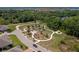Aerial view of community park offering walking paths and playground equipment for residents at 2733 Attwater Loop, Winter Haven, FL 33884