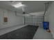 Spacious garage with a durable floor covering, an automatic garage door, and ample room for parking and storage at 2733 Attwater Loop, Winter Haven, FL 33884