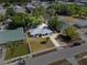Aerial view of the house showing the roof, backyard, driveway and surrounding area at 275 Cherry Laurel Ln, Winter Haven, FL 33880