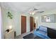 Bedroom with furniture, a sofa, and light green walls at 275 Cherry Laurel Ln, Winter Haven, FL 33880