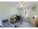 Bedroom with carpeted floors and a desk, suitable for a home office at 275 Cherry Laurel Ln, Winter Haven, FL 33880