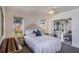 Inviting bedroom featuring ample natural light, a comfortable bed, and serene outdoor views at 284 Lake Suzanne Dr, Lake Wales, FL 33859