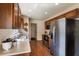 Functional kitchen featuring stainless steel appliances, ample counter space, and a modern sink at 284 Lake Suzanne Dr, Lake Wales, FL 33859