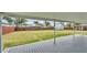 Spacious backyard view from covered patio with lush green grass and privacy fence at 317 Oak Trl, Lakeland, FL 33813