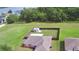 A high-angle aerial view showcases the expansive backyard with a storage shed at 3430 Hilson Dr, Lakeland, FL 33812