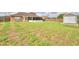 Large backyard featuring grass and a shed at 3430 Hilson Dr, Lakeland, FL 33812