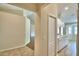Hallway view of the kitchen, providing a glimpse of the home's layout and seamless flow between rooms at 3430 Hilson Dr, Lakeland, FL 33812